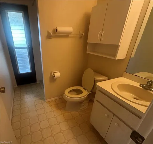 Bathroom Two has door leading out to the Sunroom.