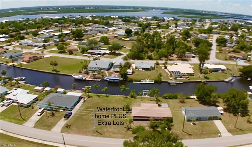 Prime waterfront home PLUS extra lot on a separate parcel