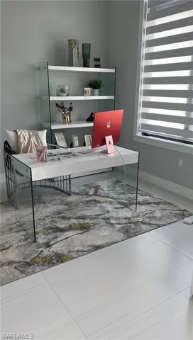 Office featuring baseboards