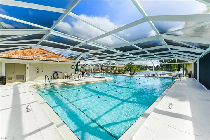 Lap pool with a patio