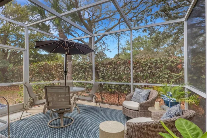 Sunroom / solarium featuring outdoor dining area and plenty of natural light