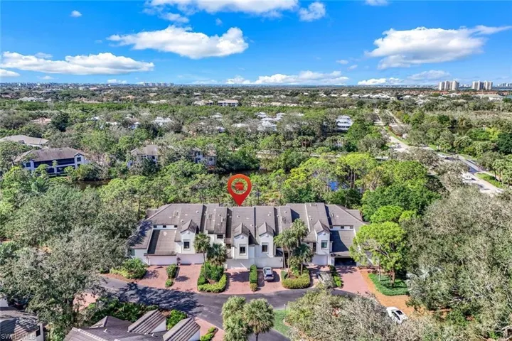 Drone / aerial view of a tree filled landscape