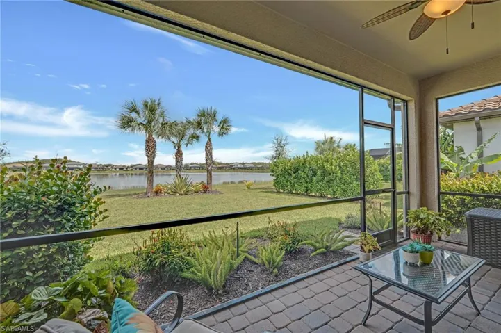 Unfurnished sunroom with a water view