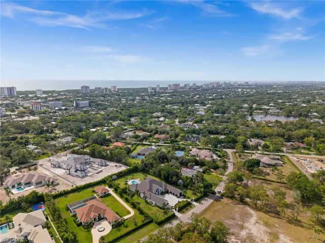 View of property location featuring nearby urban area and a nearby body of water