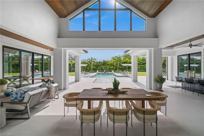 Patio featuring lofted ceiling and plenty of natural light