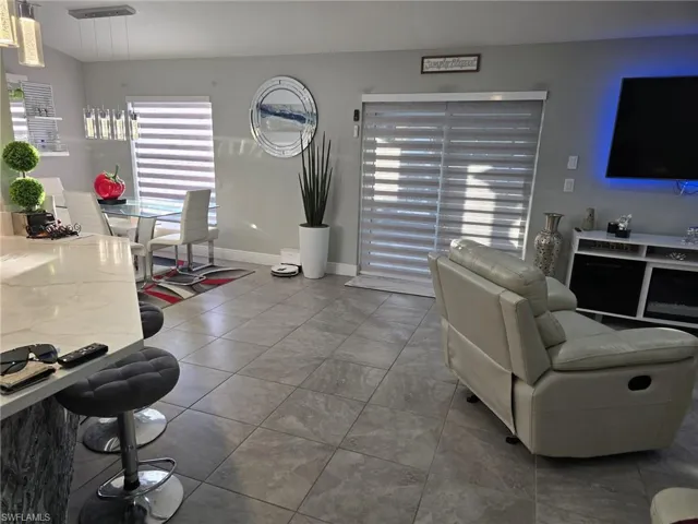 Living room featuring baseboards