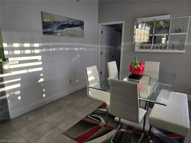 Dining space featuring baseboards