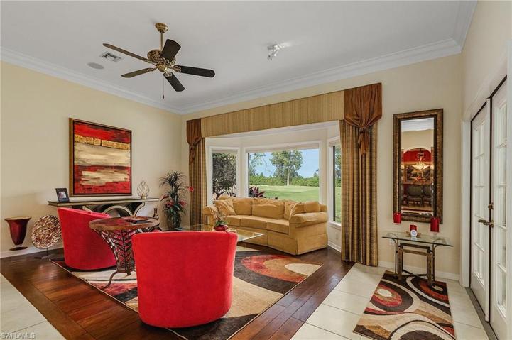 The bay window of the family room overlooks hole #16 of the Loch Ness golf course.