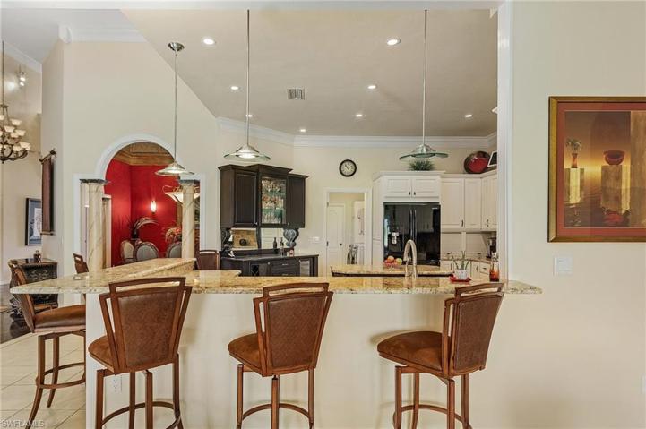 Kitchen features a breakfast bar with enough room to sit 6 people.