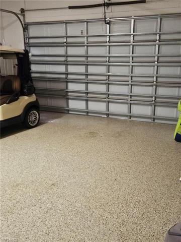 Garage has been coated with the epoxy floor finish.