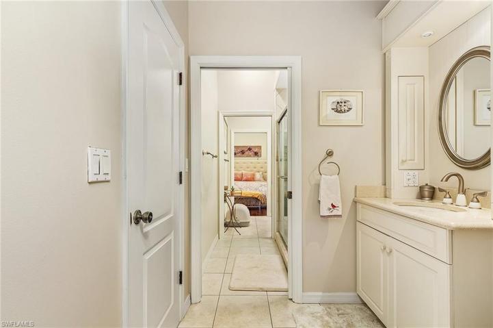Guest bath has tile floors, tiled shower, separate quarters for each guest.