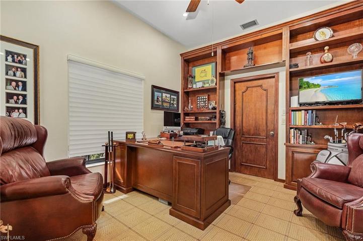 Den has plenty of space for dual work spaces.