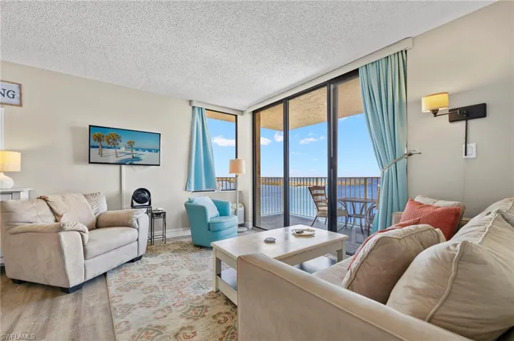 Living room with views of back bay