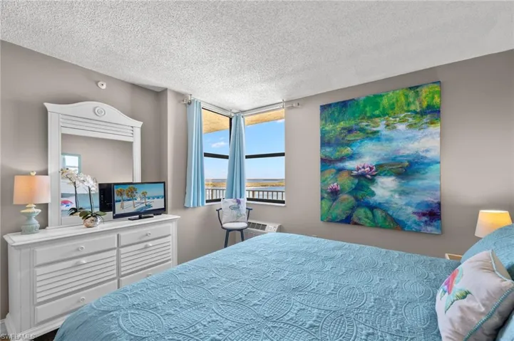 Bedroom with featured artwork