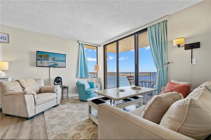 Living room with back bay views