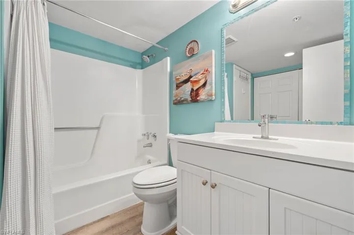 Bathroom with featured artwork