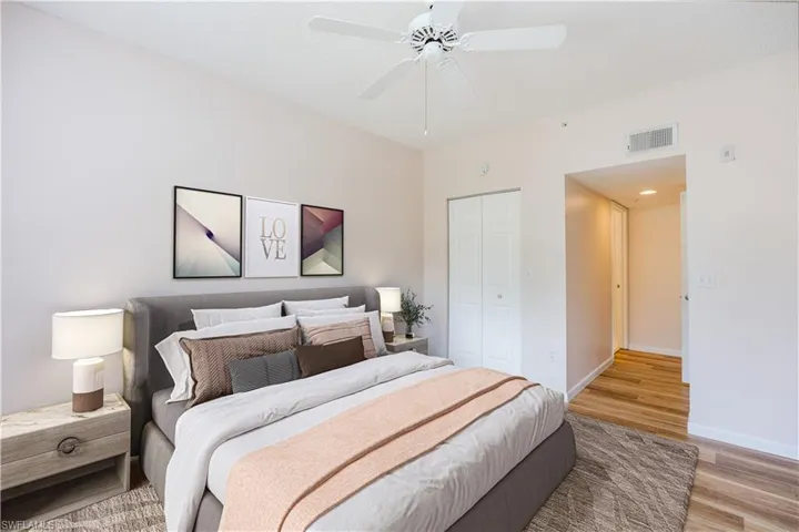 Virtually Staged Master Bedroom- Light & Bright Bedroom with Canal View