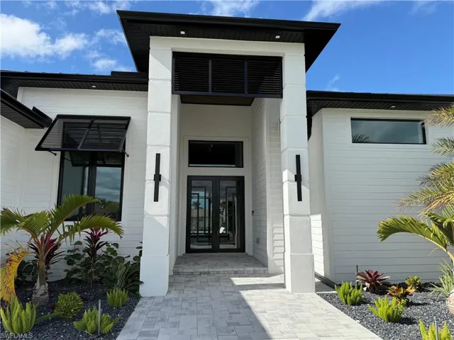 Entrance to property featuring french doors