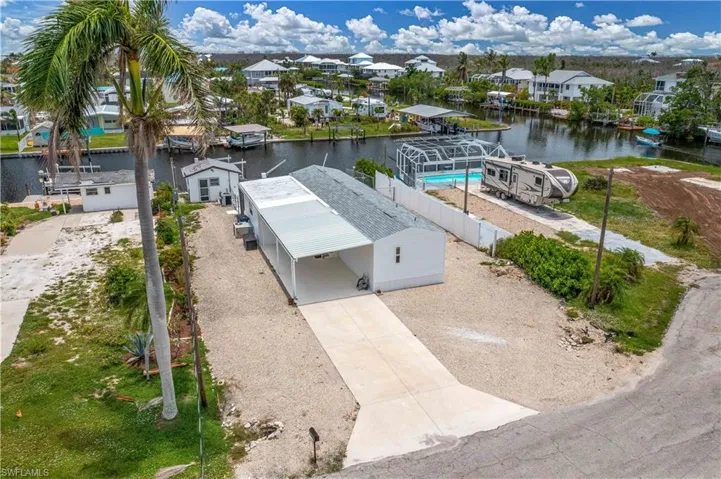 No Carport is on the property , Unit is fine.