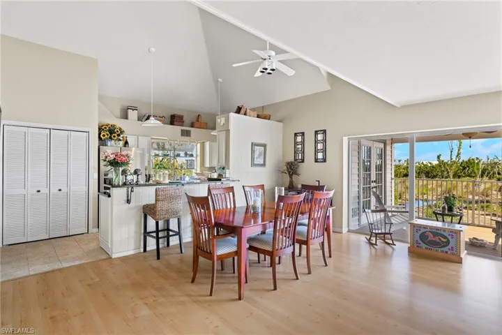 Office area featuring french doors, light hardwood / wood-style flooring, and ceiling fan