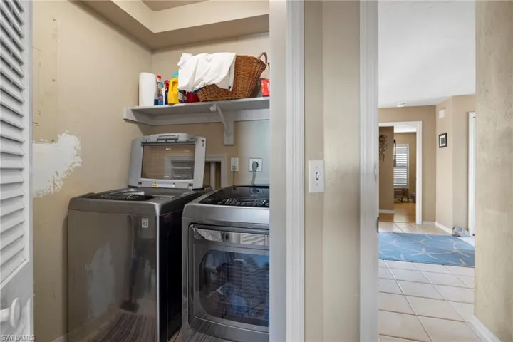 Office with light hardwood / wood-style floors, plenty of natural light, and ceiling fan