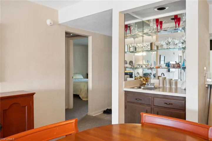 Bar with a sink and indoor wet bar