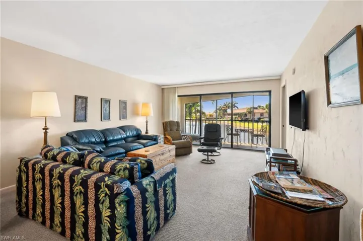 Living room featuring carpet