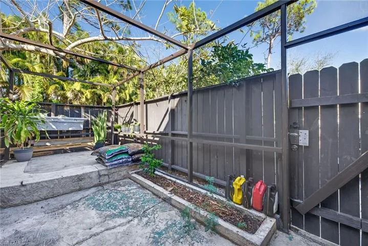 View of fenced courtyard garden
