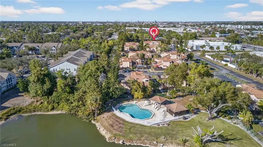 Bird's eye view of a pool and a large body of water