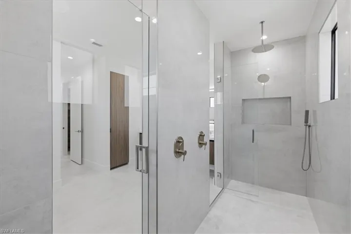 Full bath with a stall shower and recessed lighting