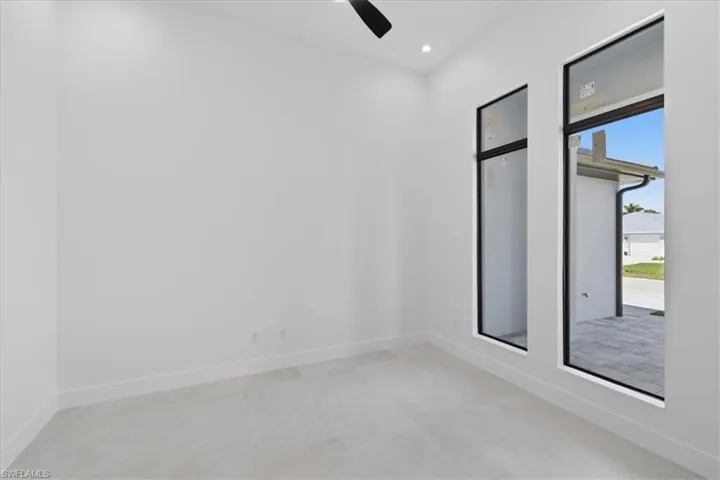 Unfurnished room featuring recessed lighting and ceiling fan