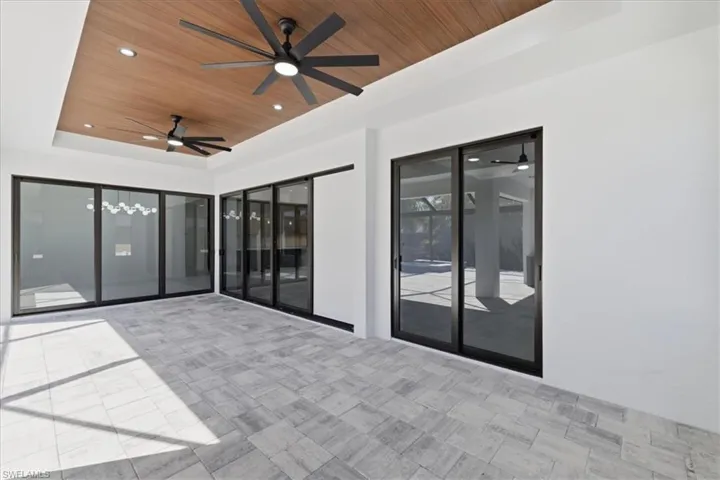 View of patio with ceiling fan