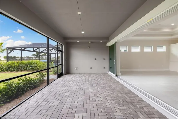 Hurricane impact sliders disappear into the wall extending your living space outdoors.