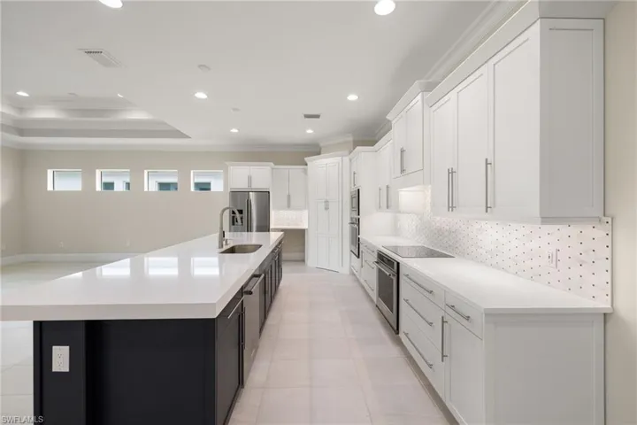Large kitchen has walk-in pantry