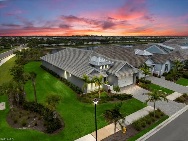 Corner lot, front & rear water views!