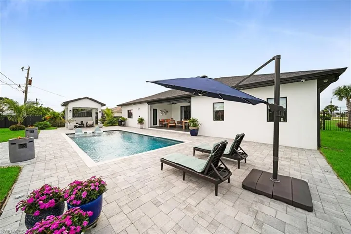 View of swimming pool featuring a patio