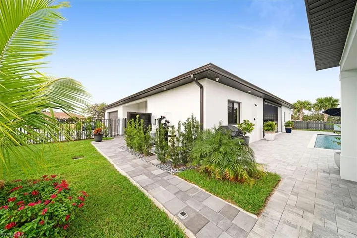 View of side of property featuring a patio area