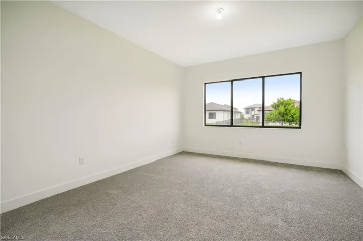 Spare room with carpet floors