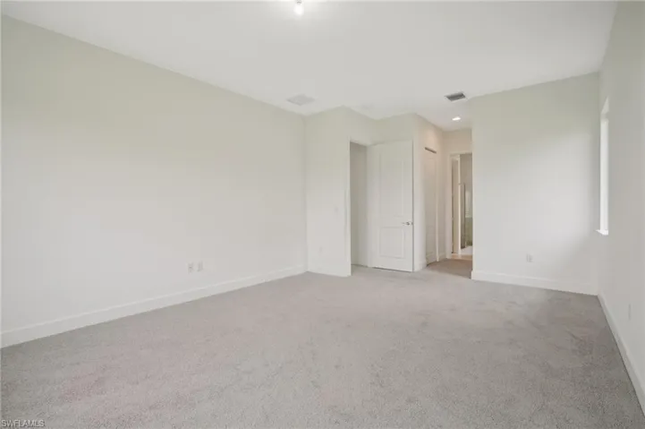 View of carpeted spare room