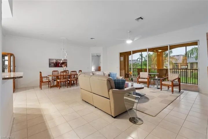 Living room with  dining area in the background