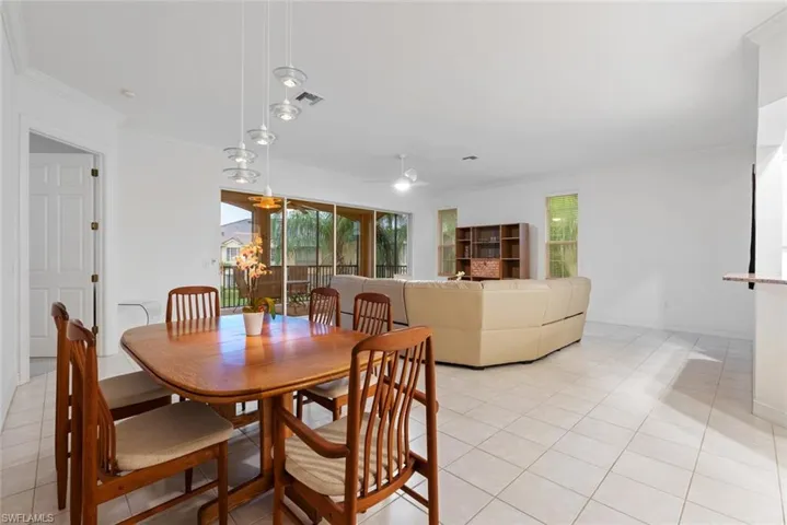 Dining area with living room in the background