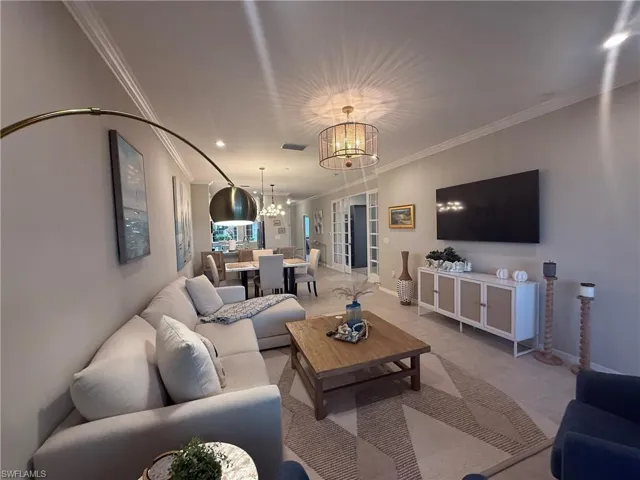 Recessed lighting, crown molding, and tiled flooring