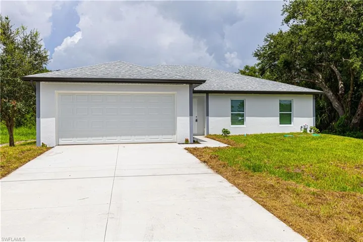 View of front of home featuring a front lawn
