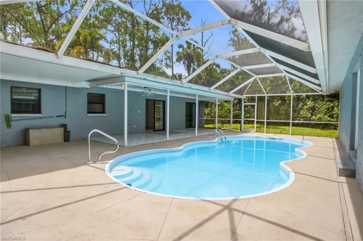 Step outside to your own PRIVATE SCREENED LANAI overlooking peaceful, wooded views.