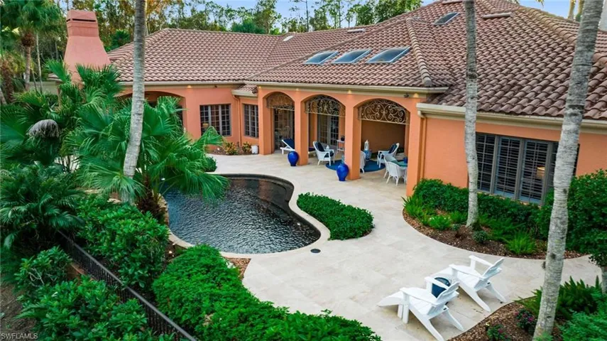Rear view of property with a patio