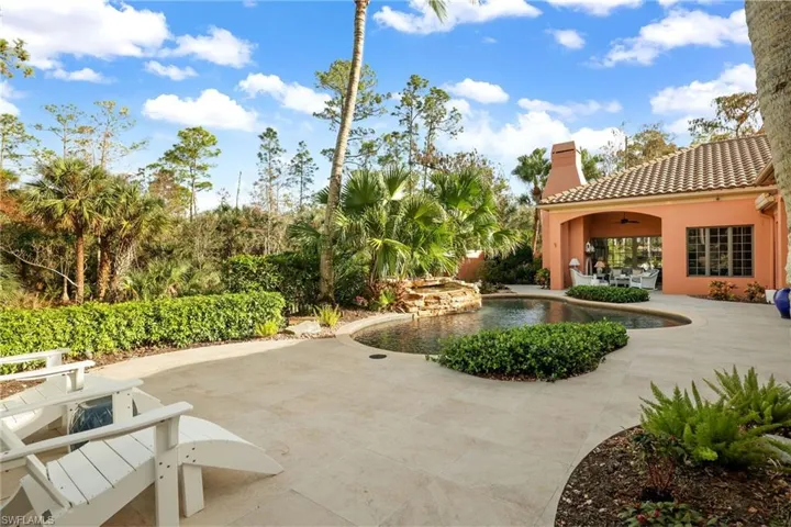 View of home's community with a patio and a pool