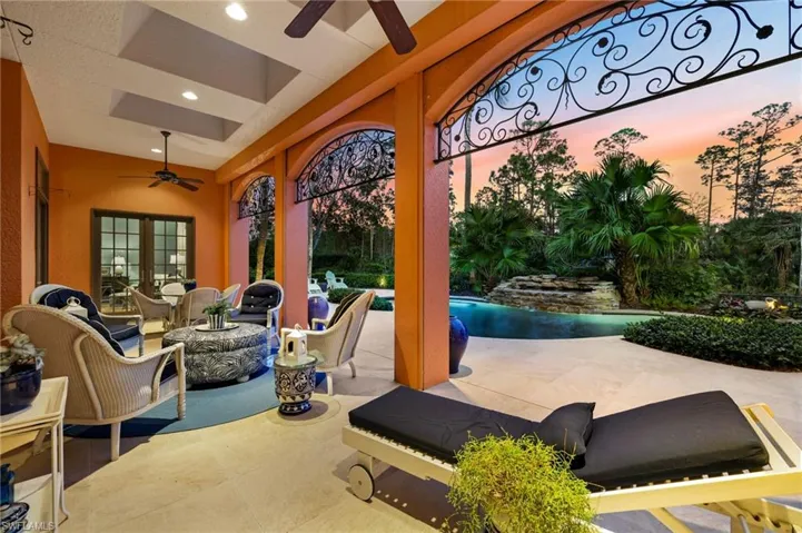 Patio terrace at dusk with french doors and ceiling fan