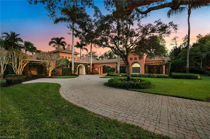 Mediterranean / spanish-style house featuring a yard