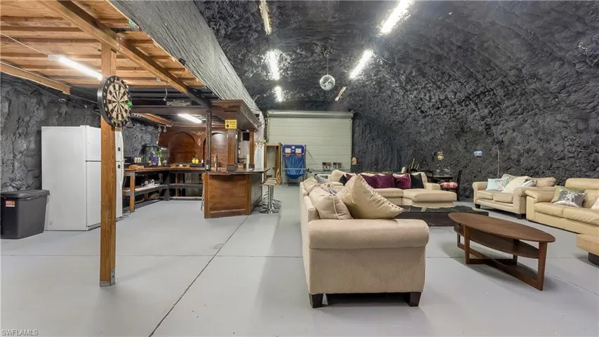 Living area featuring finished concrete floors