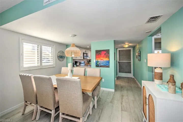 Dining space featuring light wood-type flooring